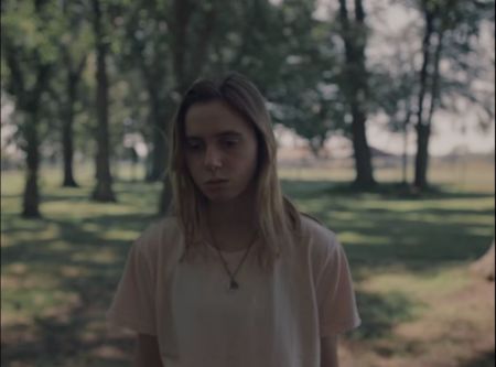 Julien Baker in "Turn Out The Lights" music video, published on October 11, 2017.