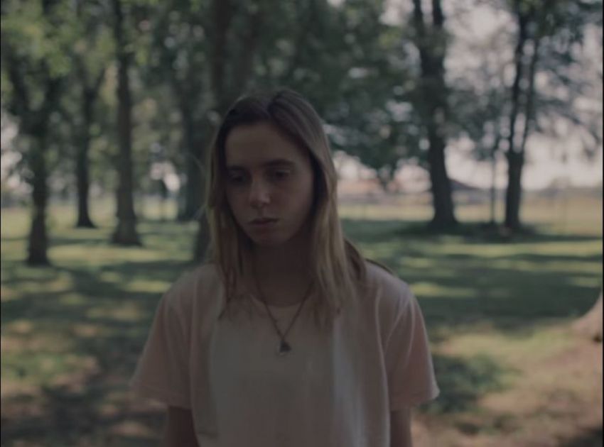 Julien Baker in "Turn Out The Lights" music video, published on October 11, 2017.