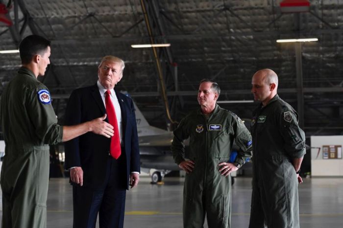President Donald Trump meeting with US airmen and Air Force Chief of Staff Gen. David L. Goldfein at Joint Base Andrews, Maryland, September 15, 2017.