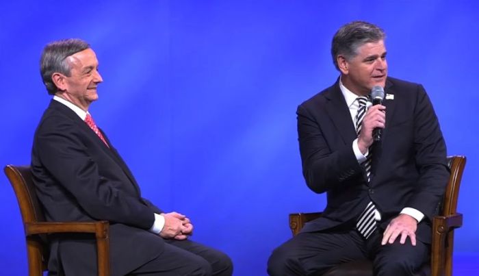Megachurch pastor Robert Jeffress (L) and Fox News host (R) Sean Hannity participate in an interview at First Baptist Dallas on Oct. 22, 2017.