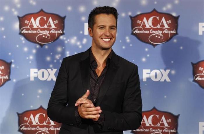 Musician Luke Bryan poses backstage during the 4th annual American Country Awards in Las Vegas, Nevada, December 10, 2013.