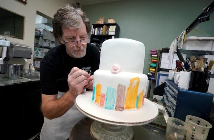 Masterpiece Cakeshop owner Jack Phillips decorates a cake in Lakewood, Colorado, September 21, 2017.