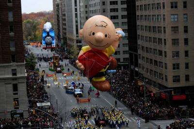 A Charlie Brown giant balloon makes its way down 6th Avenue during the 90th Macy's Thanksgiving Day Parade in Manhattan, New York.