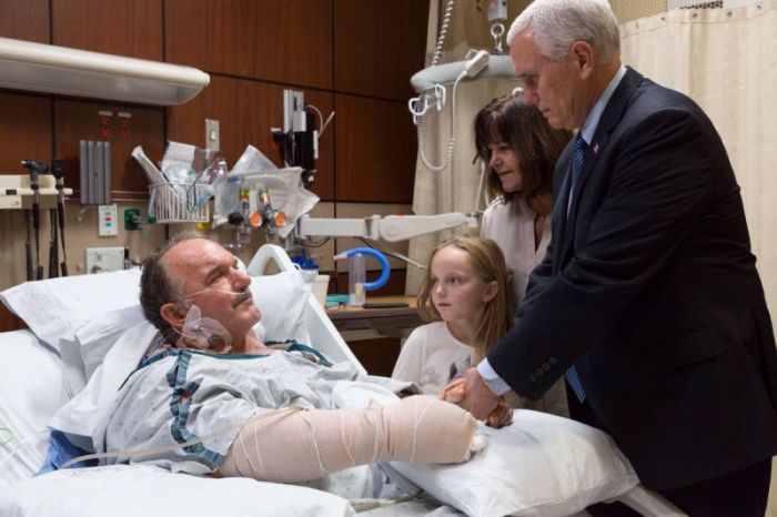 Vice President Mike Pence and his wife Karen meet with a survivor of the First Baptist Church of Sutherland Springs massacre at Brooke Army Medical Center and University Hospital in San Antonio, Texas on Wednesday November 8, 2017.