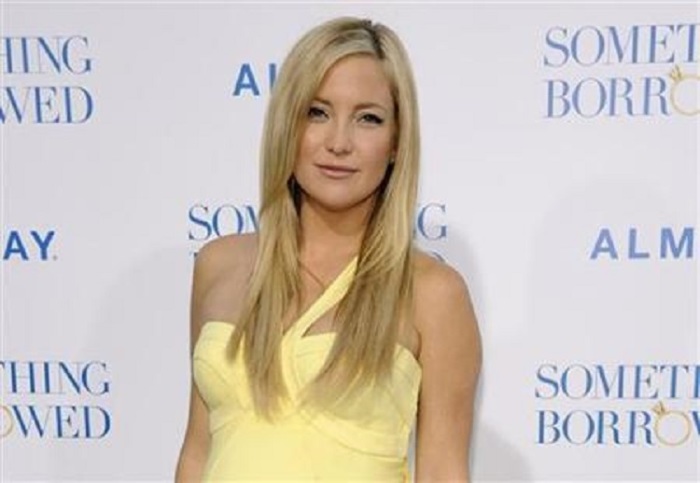Kate Hudson laughed off rumors linking her to Brad Pitt after his separation from Angelina Jolie.