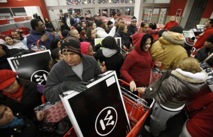 Shoppers rush for televisions at a Target store in Chicago November 27, 2009.
