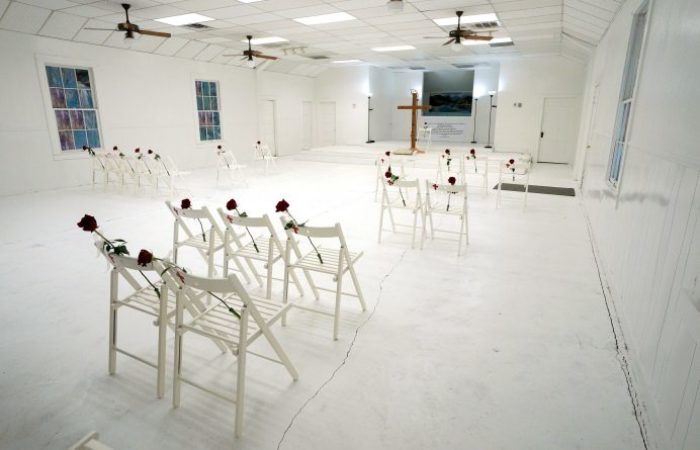 Chairs and roses mark where worshipers were found dead at the First Baptist Church of Sutherland Springs where 26 people were killed one week ago, as the church opens to the public as a memorial to those killed, in Sutherland Springs, Texas, U.S. November 12, 2017.