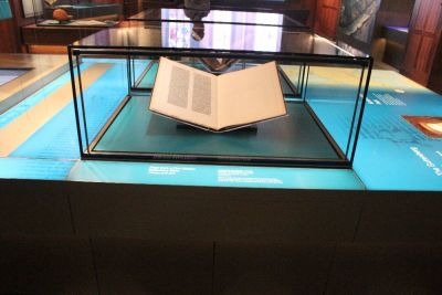 A page from a first edition Johannes Gutenberg Bible sits on display in the Museum of the Bible in Washington, D.C.