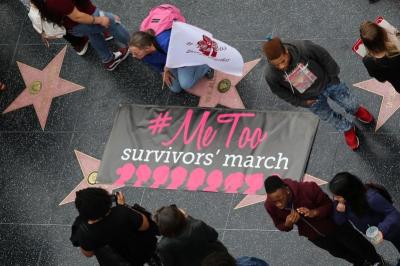 Women take part in a #MeToo protest march for survivors of sexual assault and their supporters in Hollywood, Los Angeles, California U.S. November 12, 2017.