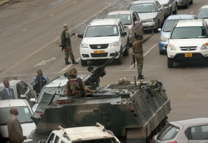 Military vehicles and soldiers patrol the streets in Harare, Zimbabwe, November 15,2017.
