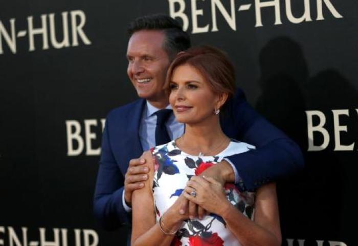 Executive producer Roma Downey and her husband producer Mark Burnett pose at the premiere for the movie 'Ben-Hur.'