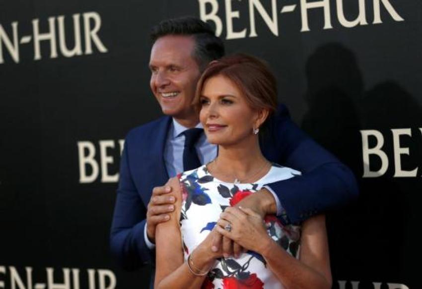 Executive producer Roma Downey and her husband producer Mark Burnett pose at the premiere for the movie "Ben-Hur."