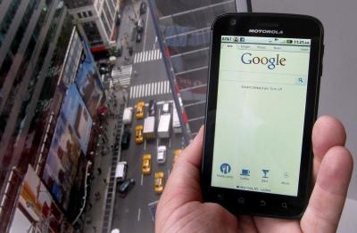 Credit : A posed picture shows a phone displaying the Google search page in New York August 15, 2011.