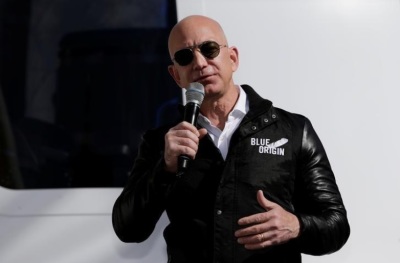 Amazon and Blue Origin founder Jeff Bezos addresses the media at the 33rd Space Symposium in Colorado Springs, Colorado, United States April 5, 2017.