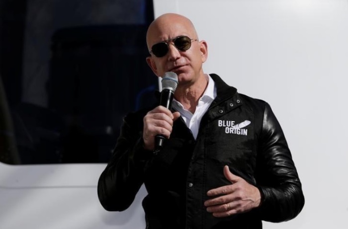 Amazon and Blue Origin founder Jeff Bezos addresses the media about the New Shepard rocket booster and Crew Capsule mockup at the 33rd Space Symposium in Colorado Springs, Colorado, United States April 5, 2017.