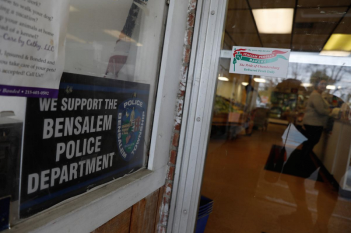 A sign supporting the Bensalem Police Department is seen posted outside a food market in Bensalem, Pennsylvania, U.S., October 25, 2017.