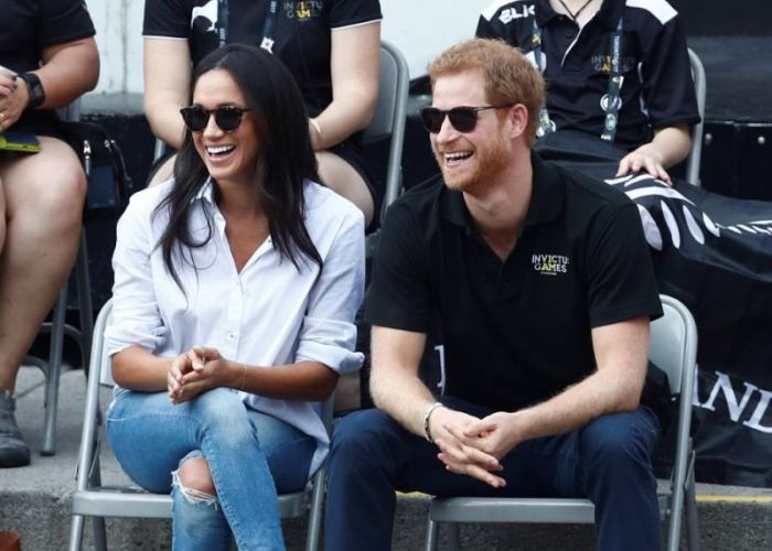 Britain's Prince Harry and his girlfriend actress Meghan Markle watch the wheelchair tennis event during the Invictus Games in Toronto, Ontario, Canada September 25, 2017.