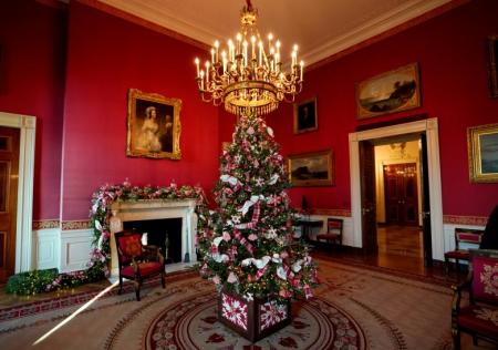 Christmas decor adorns Red Room at the White House in Washington, D.C. November 27, 2017.