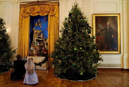 The White House creche and other Christmas decor adorns the East Room of the White House, Washington, D.C. on November 27, 2017.