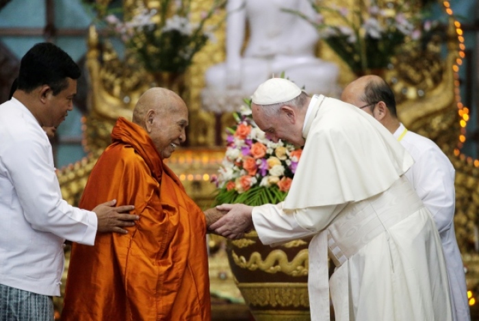Pope Francis shakes hands with Bhaddanta Kumarabhivasma, chairman of the state Sangha Maha Nayaka Committee, during a meeting with the Buddhist committee in Yangon, Myanmar November 29, 2017.