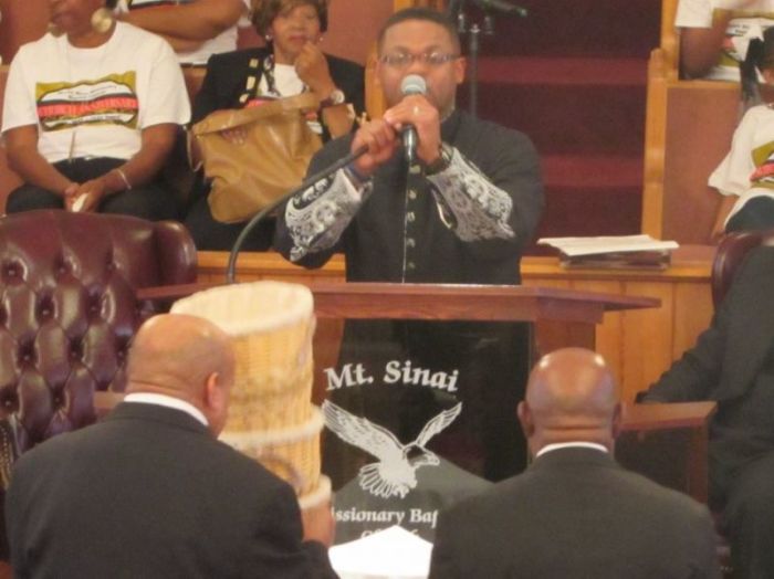 Pastor Stafford Dudley Sr., (pulpit) at the pulpit of Mount Sinai Missionary Baptist Church in Newnan, Georgia.