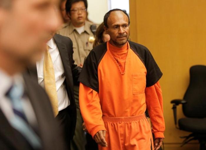 Jose Ines Garcia Zarate, arrested in connection with the July 1, 2015, shooting of Kate Steinle on a pier in San Francisco is led into the Hall of Justice for his arraignment in San Francisco, California, U.S. on July 7, 2015.