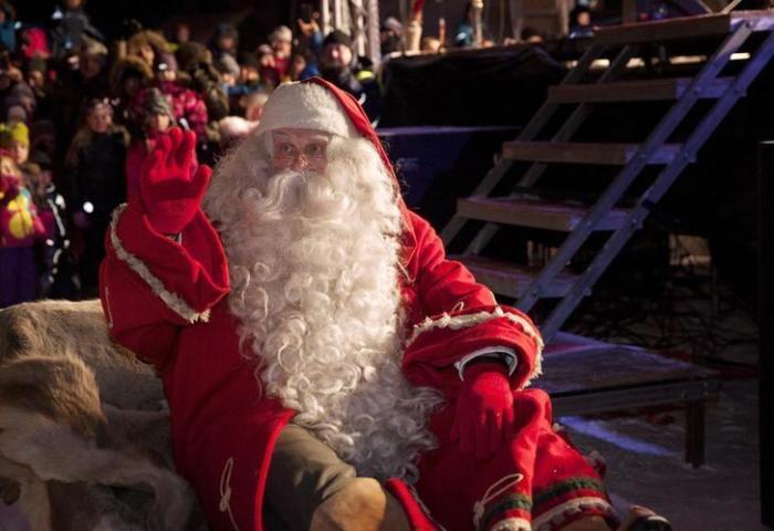 A man dressed as Santa Claus leaves for his annual Christmas journey from the Santa Claus Village at the Arctic Circle in Rovaniemi, Finnish Lapland December 23, 2014.
