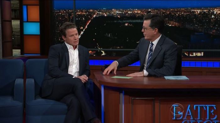 Billy Bush (L) speaking on CBS' 'The Late Show With Stephen Colbert' in an appearance on December 5, 2017.