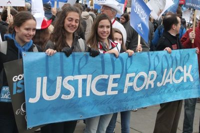 Supporters of Colorado baker Jack Phillips hold a banner outside the United States Supreme Court as arguments in the case of Masterpiece Cakeshop v. Colorado Civil Rights Commission are heard on December 5, 2017.