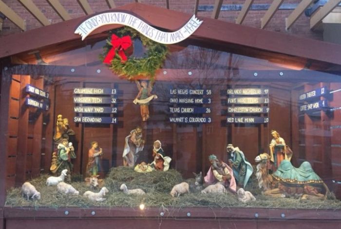 Saint Susanna Parish of Dedham, Massachusetts, has erected a Nativity scene featuring a list of mass shootings in the United States, December 2017.