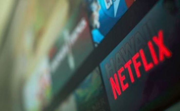 The Netflix logo is pictured on a television in this illustration photograph taken in Encinitas, California, U.S., January 18, 2017.