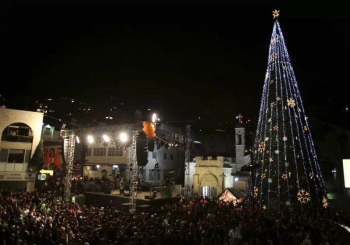 People attend a Christmas tree lighting ceremony in Nazareth in this undated photo.