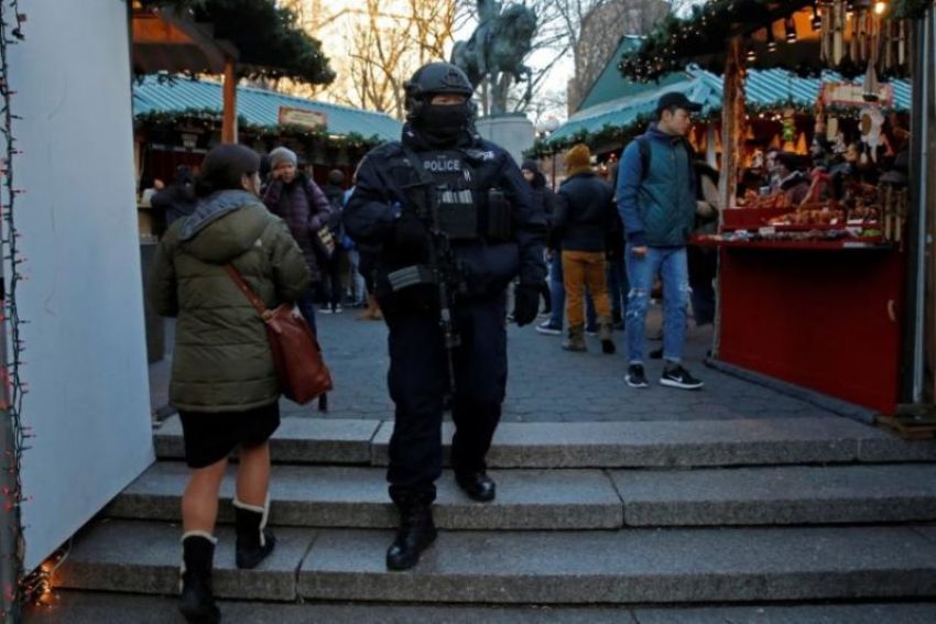A member of the New York Police Department's Counterterrorism Bureau patrols the Union Square holiday market following the Berlin Christmas market attacks in Manhattan, New York City, December 20, 2017.