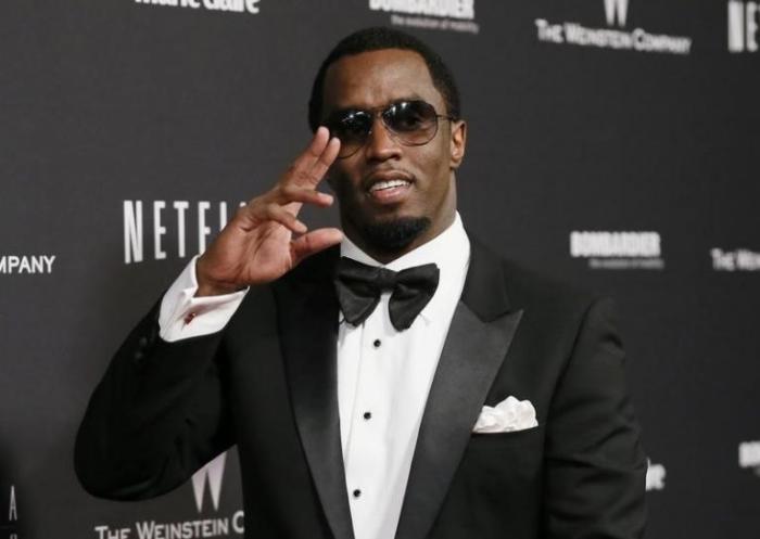 Sean 'Diddy' Combs arrives at The Weinstein Company & Netflix after party after the 71st annual Golden Globe Awards in Beverly Hills, California, January 12, 2014.