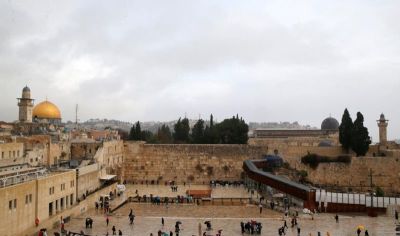 A general view shows the Dome of the Rock (L) and the Western Wall (C) in Jerusalem's Old City December 6, 2017.