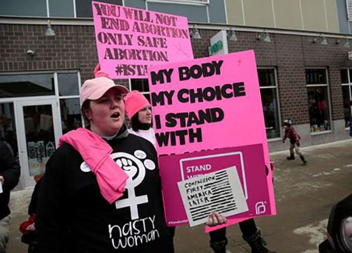 Pro-choice supporters of Planned Parenthood rally outside a Planned Parenthood clinic in Detroit, Michigan, U.S. February 11, 2017.