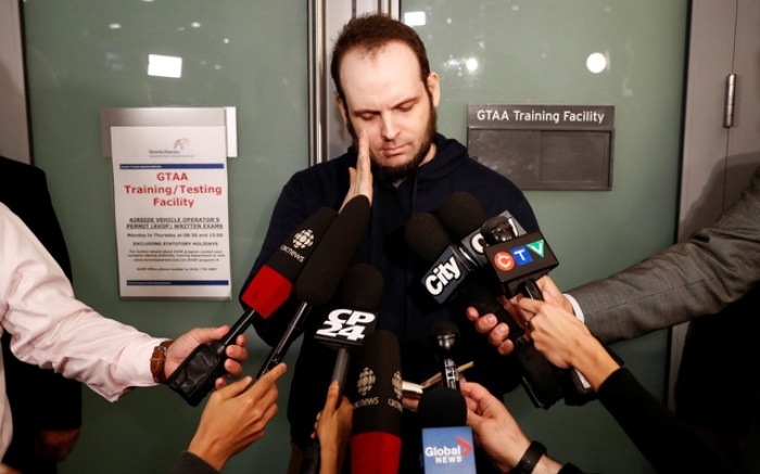 Joshua Boyle speaks to the media after arriving with his wife and three children to Toronto Pearson International Airport, nearly 5 years after he and his wife were abducted in Afghanistan in 2012 by the Taliban-allied Haqqani network, in Toronto, Ontario, Canada, October 13, 2017.