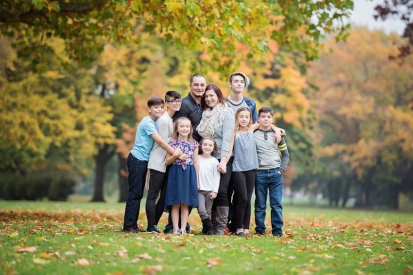 Pastor Joel Royce (C) and his family.