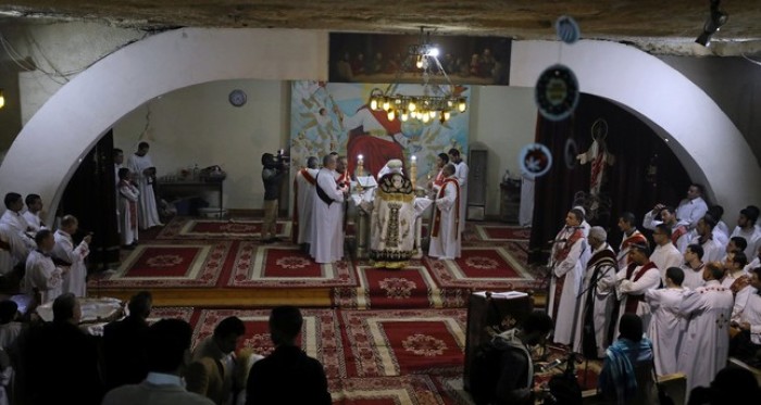 Coptic Orthodox Christian priests and deacons attend Christmas eve mass at a church in Saint Samaan the tanner Monastery in Cairo, Egypt January 6, 2018.