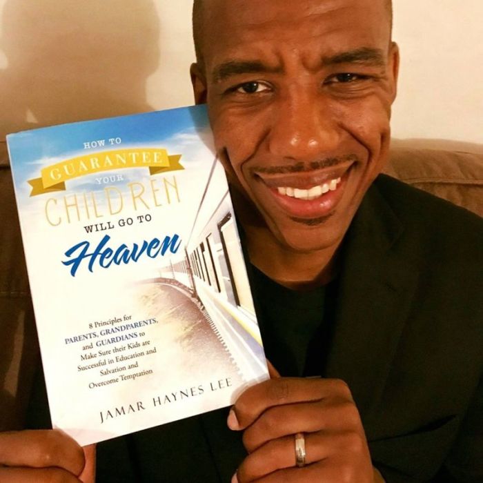 Rev. Jamar Haynes Lee with his new book, 'How to Guarantee Your Children Will Go to Heaven.'