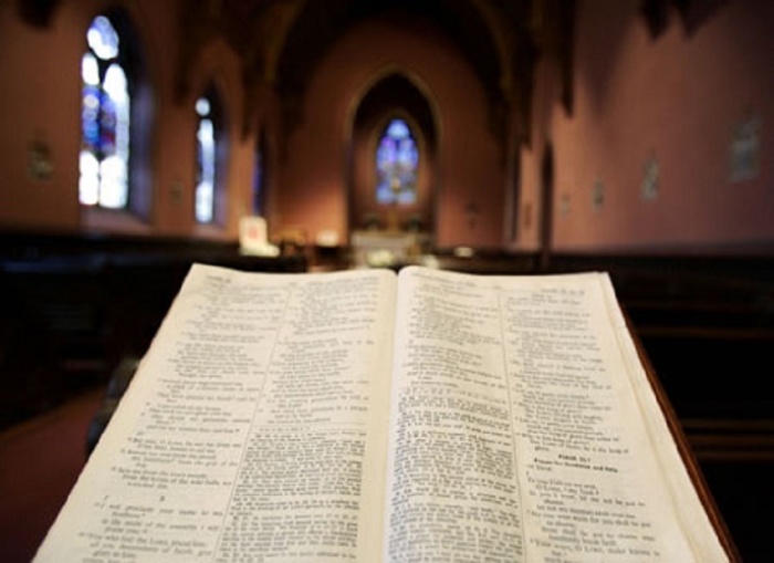 An open Bible inside a church.