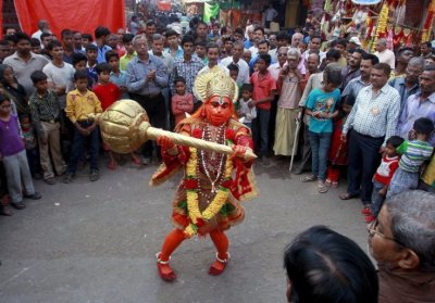A man dressed Hanuman performs on a street during Hanuman Jayanti Festival in Allahabad, India, in this undated photo.
