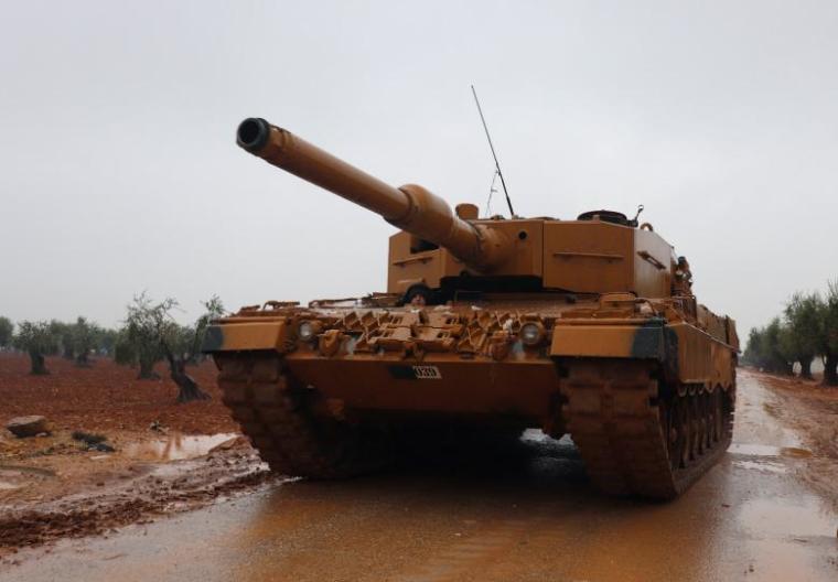 A Turkish military tank is seen near Mount Barsaya, northeast of Afrin, Syria, January 23,2018.