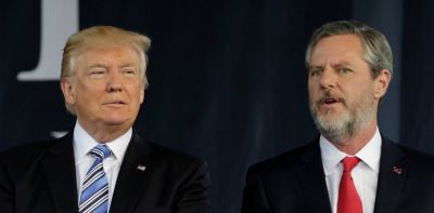 U.S. President Donald Trump (L) stands with Liberty University President Jerry Falwell, Jr. after delivering keynote address at commencement in Lynchburg, Virginia, U.S., May 13, 2017.
