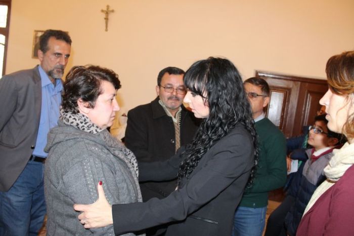Assyrian activist Juliana Taimoorazy of the Iraqi Christian Relief Council meets with Iraqi Christian refugees in Amman, Jordan, during a trip there in January 2018. The organization distributed over 2,400 buckets of food to refugees in Jordan and Iraq.