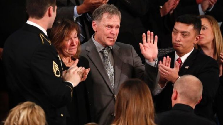 American student Otto Warmbier's parents Fred and Cindy Warmbier applaud as U.S. President Donald Trump talks about the death of their son Otto after his arrest in North Korea during the State of the Union address to a joint session of the U.S. Congress on Capitol Hill in Washington, U.S. January 30, 2018.