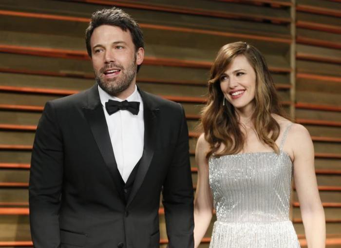 Actor Ben Affleck and his wife, actress Jennifer Garner arrive at the 2014 Vanity Fair Oscars Party in West Hollywood, California March 2, 2014.