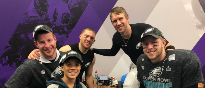 Philadelphia Eagles quarterbacks Nick Foles, Carson Wentz & Nate Sudfeld along with Zach Ertz are pictured with Hall-of-Fame former NFL coach Tony Dungy's son Justin.