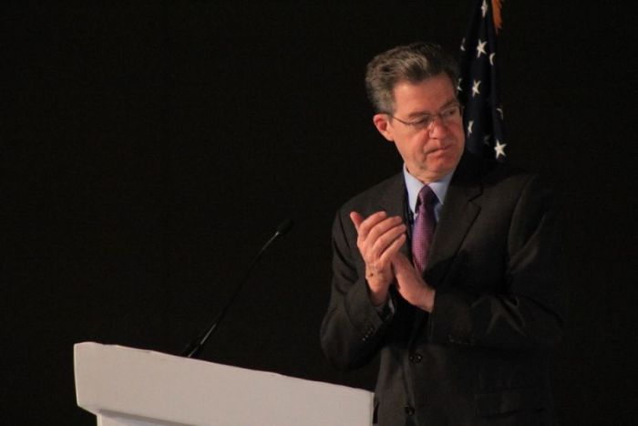 United States Ambassador at-Large for International Religious Freedom Sam Brownback applauds Shaykh Abdullah Bin Bayyah during his speech at the 'Alliance of Virtue' conference at the Marriott Marquis in Washington, D.C. on Feb. 6, 2018.