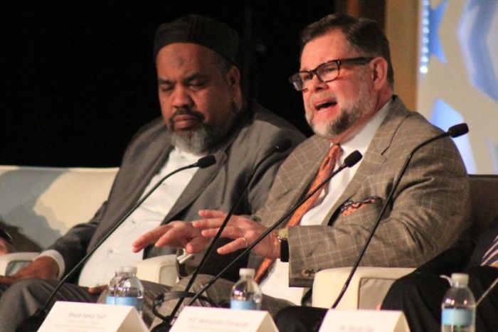 Pastor Bob Roberts from Northwood Church in Keller, Texas (R) speaks during a panel discussion after the unveiling of The Washington Declaration at the Marriott Marquis in Washington, D.C. on February 7, 2018. Roberts is flanked on his right by Imam Mohamed Magid, executive imam of the All Dulles Area Muslim Society in Virginia.